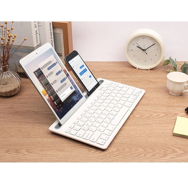 CE Rohs Certified Mini Portable Slim Silent Wireless BT Keyboard for Apple iPad iPhone Android Tablet Phone