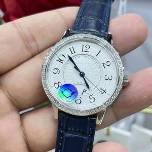 Reloj automático premium para mujer con fase lunar, bisel con incrustaciones de diamantes, esfera con efecto rayos de sol, correa de cuero azul, reloj de pulsera de lujo a la moda - Product Image 3