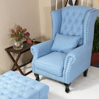 Fauteuil lounge à dossier haut capitonné et ottoman, fauteuil de détente en cuir rembourré pour le coin lecture du hall d'hôtel