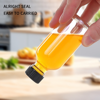 Mini Bouteilles en Verre Transparentes de 60 ml (2 oz) pour Voyage, Petites Bouteilles de Bien-être, Liqueur, Shots de Gingembre, Potions, Jus avec Couvercle – Vente en Gros