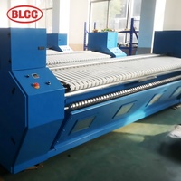Équipement de blanchisserie industriel commercial automatique du fabricant BLCC-Machine d'alimentation en draps de lit électrique pour hôtels