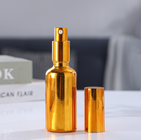 Flacon compte-gouttes en verre plaqué or et argent sur mesure avec pipette à bulbe en caoutchouc pour emballage cosmétique d'huiles essentielles et sérums