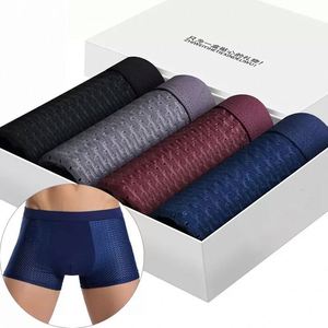 Men's Mesh Shorts Ice Silk <b>Seamless</b> Boxer Briefs Breathable Cool Knitted Fabric Mesh Shorts Classic Embroidered Spandex ODM - Product Image 1