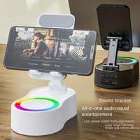 Support de téléphone de bureau pliable à induction multifonctionnel sans fil avec haut-parleur, batterie, éclairage d'ambiance et charge rapide