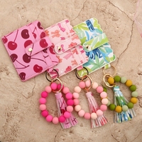 Nouveau porte-clés bracelet en perles PU avec étui à cartes imprimé – Pochette papillon pour femme pour la Saint-Valentin et le Nouvel An