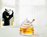 Niedlicher Honigtopf aus Glas im Bienenstock-Design mit passendem Deckel