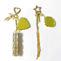 Porte-clés en acier inoxydable tendance 2026, pendentif miroir en forme d'étoile et de cœur, breloque de sac à main, sac en filet pour rouge à lèvres
