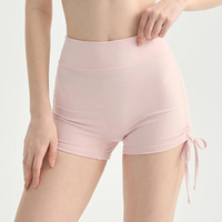Shorts de yoga best-sellers pour femme, effet ventre plat, en Spandex/Nylon, motif uni, sans coutures apparentes, design ultra-confortable, avec cordon de serrage