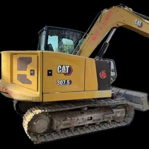 Excavatrice Caterpillar 307.5 d'occasion, modèle 2023, capacité de la benne de 0,2 m³, poids opérationnel de 7 tonnes, bon état de fonctionnement, moteur inclus - Product Image 1