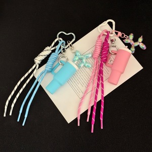 2026 Pendentif tissé rechargeable pour sac, avec porte-rouge à lèvres, porte-clés, double suspension et cordon perlé, vente en gros - Product Image 5