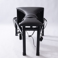 Chaise de bondage BDSM noire pour positionnement et maintien, avec fonction d'orgasme forcé et de fessée, équipement de bondage