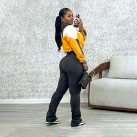 Ensemble de survêtement pour femme disponible : Haut court zippé et pantalon évasé moulant, 2 pièces, tenue de fitness patchwork