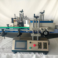 Machine d'étiquetage automatique de bouteilles rondes de table avec convoyeur, étiquette en papier manuelle, bon prix