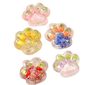 NOUVEAU Jouet à presser transparent en gelée, motif griffe de chat avec fleur et paillettes - Super rebondissant, écologique, cadeau thérapeutique pour enfants et adultes, jouet de bureau - Product Image 1