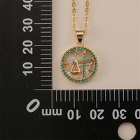 Vente en gros de collier pendentif rond en forme de coquille de couple en or avec zircon coloré et 12 signes du zodiaque pour femmes