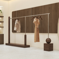 Rak Pajangan Baju Lengkung Walnut untuk Toko Pakaian, Unit Gantungan Baju Lantai dengan Papan Penyimpanan