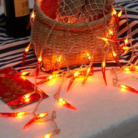 Guirlande lumineuse LED rechargeable à piles Stellight, rouge piment, en cuivre, IP44, CRI90, commande par bouton, longueur 1,5 m, décoration