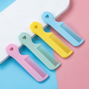 Peigne à cheveux miniature en plastique écologique pour bébé, peigne de poche portable pour la maison, peigne démêlant massant pour enfants - Product Image 1
