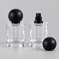Flacon pulvérisateur de parfum cylindrique en verre transparent personnalisé de 30 ml, 50 ml, 100 ml avec bouchon à bille en bois pour l'emballage de parfums