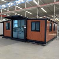 Maison conteneur pliable et extensible en acier préfabriqué, 2 chambres, 1 salle de bain, entièrement meublée, installation rapide et économique, pour usage résidentiel ou bureau.