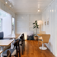 Mini-maison prête à être expédiée, offrant un design esthétique personnalisé, idéale comme abri de jardin pour une cafétéria ou un magasin de proximité