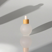 Luxe 30ml sphérique soins de la peau Essence bouteille ronde fond épais petite ampoule voyage verre compte-gouttes givre pour l'aromathérapie