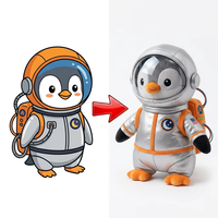 Peluche personnalisée pingouin astronaute, modèle Space Sketch, avec combinaison spatiale argentée, casque transparent, écusson lune et sac à dos fusée