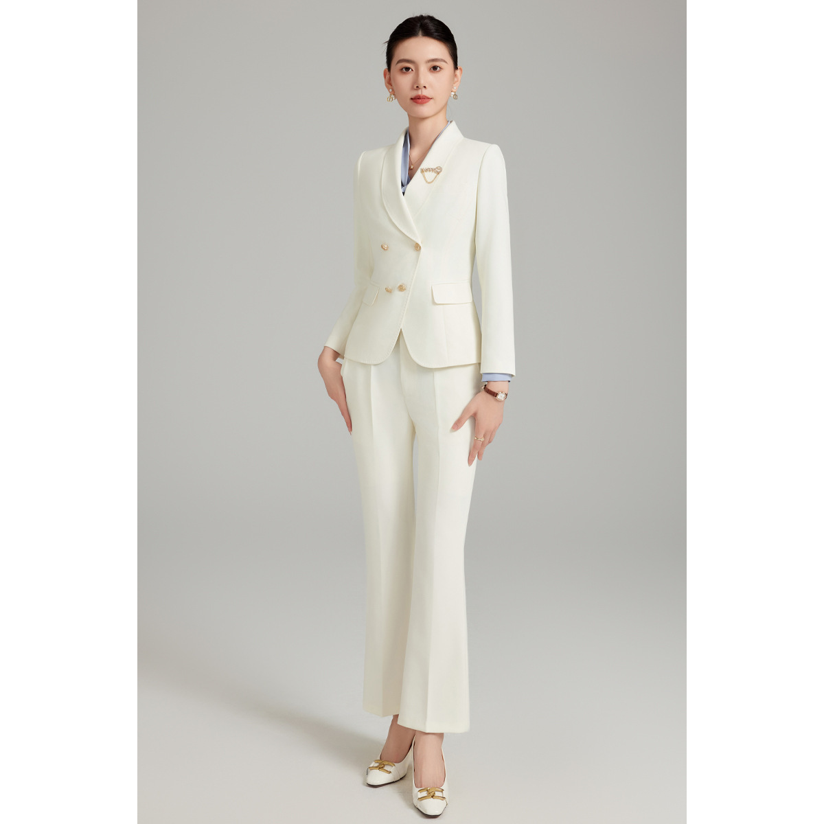 Off-white suit with slightly flared trousers