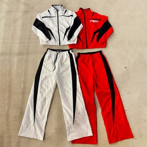 Conjunto Deportivo Personalizado al por Mayor, Conjunto de Dos Piezas, Chaqueta Cortavientos de Poliéster con Parches y Pantalones de Nailon, Traje Deportivo de Nailon - Product Image 1