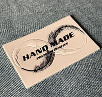 Étiquettes de vêtements en cuir gaufré personnalisées de haute qualité avec logo, écologiques, pour jeans coupés droit et sacs, fabriquées en Chine