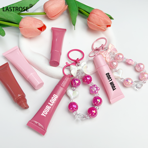 Bonito tubo exprimidor de plástico rosa para brillo de labios Esencia de labios <span class=keywords><strong>Lipoil</strong></span> contenedor vacío con llavero embalaje cosmético para forma líquida - Product Image 3