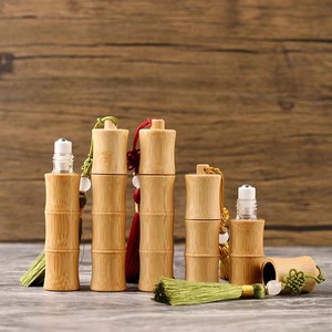 Rollo de diseño de nudo de bambú natural en botella 10ml Mini <span class=keywords><strong>Perfume</strong></span> de aceite esencial Botella a prueba de luz para aceite de esencia con borla - Product Image 5