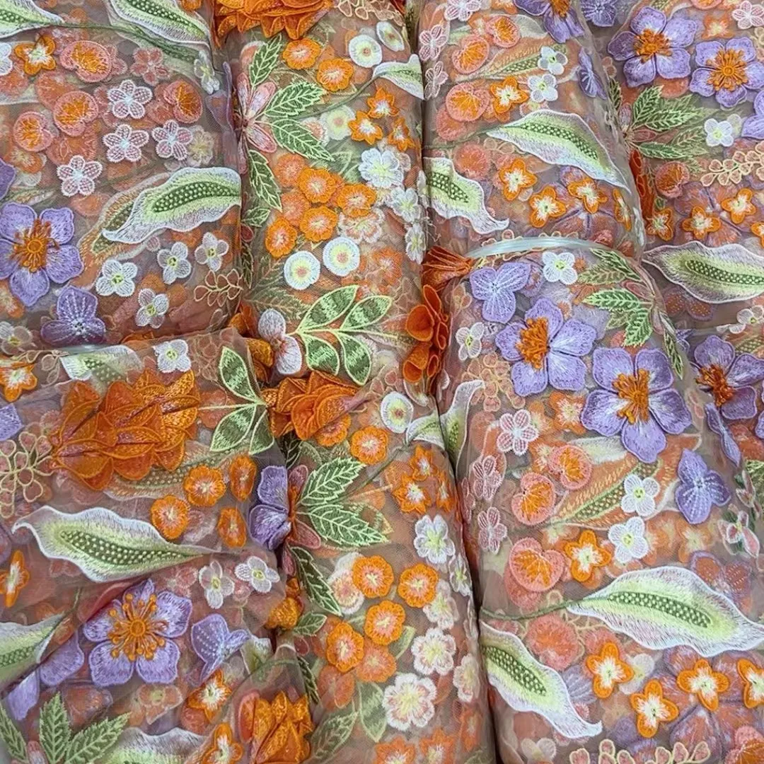 Tessuto di pizzo per abiti in rete di design con Applique floreale Haute 3D
