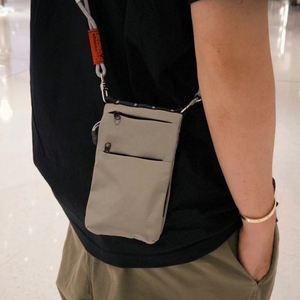 LE PETIT RUISSEAU Sac bandoulière unisexe pliable en nylon, ajusté, avec fermeture éclair, léger, durable, tendance, style japonais décontracté - Product Image 1