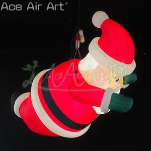 Papá Noel inflable en pose voladora de superhéroe con luz LED para decoración de techo interior - Product Image 5