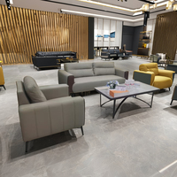 Ensemble de canapés de bureau modernes pliables en cuir synthétique personnalisés, avec cadre en bois, disponible en plusieurs couleurs, pour usage commercial.