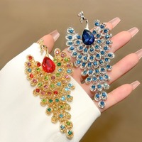 Broche de luxe pour femme, style cour, motif paon en strass, accessoire de vêtement pour costume et manteau, bijou cadeau pour couple, idéal pour les fêtes