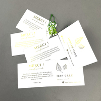 Cartes de visite personnalisées minimalistes avec logo en feuille d'or naturelle et gaufrage, coupon de réduction