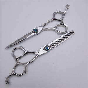 Tijeras de Entresacar Personalizables de 6.0 Pulgadas de Acero Inoxidable para Diestros, con Tuerca Cola de Fénix de 30 Dientes - Product Image 1