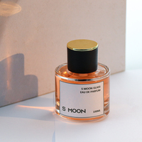 Vente en gros, faible MOQ, flacon de parfum cylindrique en verre transparent 30/50ml 100ml, atomiseur vide à brume fine avec étiquette autocollante