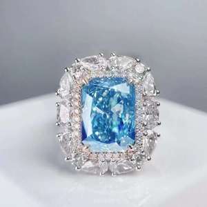 Anello di fidanzamento SGARIT personalizzato con gioielli raffinati in oro 18 carati e diamante blu fantasia da 7,010 carati, anello con gemma naturale - Product Image 1