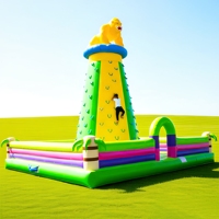 Structure gonflable portable géante avec toboggan et mur d'escalade, écologique, idéale pour les fêtes en extérieur et les rassemblements familiaux