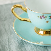 Tasse à café et soucoupes pour banquet, en céramique, en porcelaine, bon marché, artistique, vintage, à motif floral, vente en gros