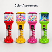 Distributeur automatique de bonbons et de jouets en capsules à monnayeur, avec jeu de boules de gomme et de bonbons rebondissants en spirale