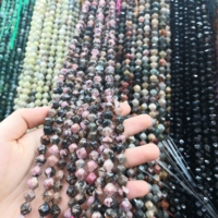 Perles en vrac de coupe de diamant de pierre précieuse de rhodochrosite de rayure noire ronde naturelle à facettes 15.5"