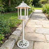 Lanterne de jardin en fonte robuste sur pied avec design orné, support de lampe extérieur et bougeoir paysager