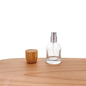 Bouteilles de parfum en verre rondes de luxe de 30ml 50ml 100ml avec bouchon en bois et joint à vis pour sérums de soins de la peau et utilisation de flacon compte-gouttes - Product Image 1