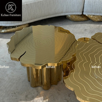 Table basse de luxe à emboîtement, sculptée en anneaux d'arbre, en acier inoxydable doré, avec plateau irrégulier en forme de tranches, pour salon de villa