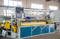Machine automatique de raccordement de film d'emballage pour balles de coton