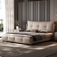 Cadre de lit en cuir véritable de luxe, design moderne minimaliste avec boucles métalliques, lit king size rembourré pour chambre principale